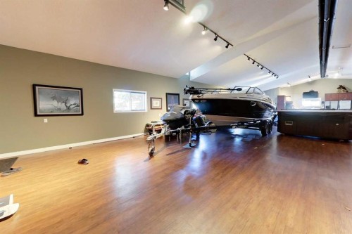 30 Executive Estates, Canyon Creek, AB - Indoor Photo Showing Gym Room