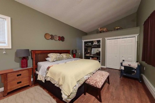 30 Executive Estates, Canyon Creek, AB - Indoor Photo Showing Bedroom