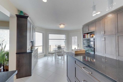 30 Executive Estates, Canyon Creek, AB - Indoor Photo Showing Kitchen