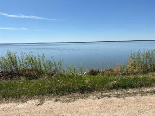 800 Mistassiniy Road, Wabasca, AB - Outdoor With Body Of Water With View