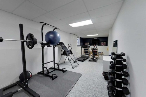 805 7 Avenue Sw, Slave Lake, AB - Indoor Photo Showing Gym Room