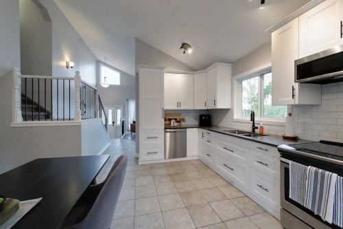 805 7 Avenue Sw, Slave Lake, AB - Indoor Photo Showing Kitchen With Double Sink With Upgraded Kitchen