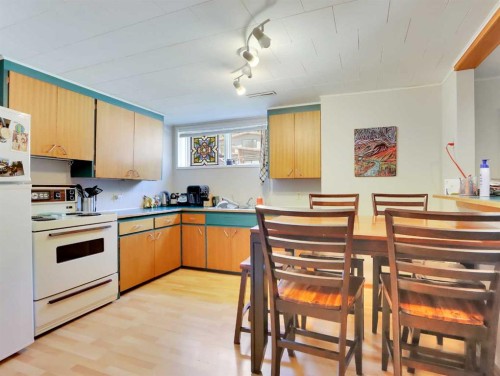 252 Three Sisters Drive, Canmore, AB - Indoor Photo Showing Kitchen With Double Sink