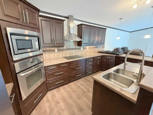 670051A Highway 813, Rural Athabasca County, AB - Indoor Photo Showing Kitchen With Double Sink