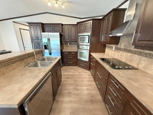 670051A Highway 813, Rural Athabasca County, AB - Indoor Photo Showing Kitchen With Double Sink