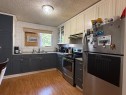 4817 42 Street, Athabasca, AB  - Indoor Photo Showing Kitchen With Double Sink 