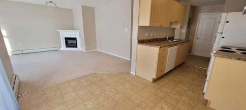 101-1615 41 Street, Edson, AB - Indoor With Fireplace