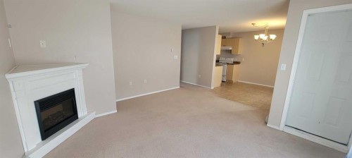 101-1615 41 Street, Edson, AB - Indoor With Fireplace