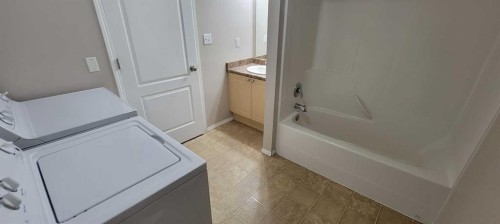 101-1615 41 Street, Edson, AB - Indoor Photo Showing Laundry Room