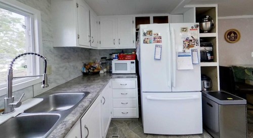 5124 8 Avenue, Edson, AB - Indoor Photo Showing Kitchen With Double Sink