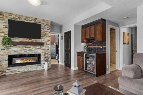 101 Wapiti Close, Canmore, AB - Indoor Photo Showing Living Room With Fireplace