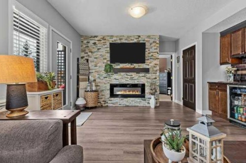 101 Wapiti Close, Canmore, AB - Indoor Photo Showing Living Room With Fireplace