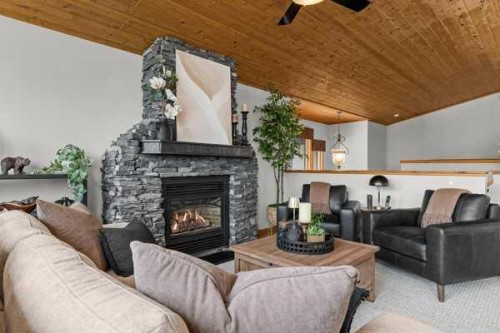 101 Wapiti Close, Canmore, AB - Indoor Photo Showing Living Room With Fireplace