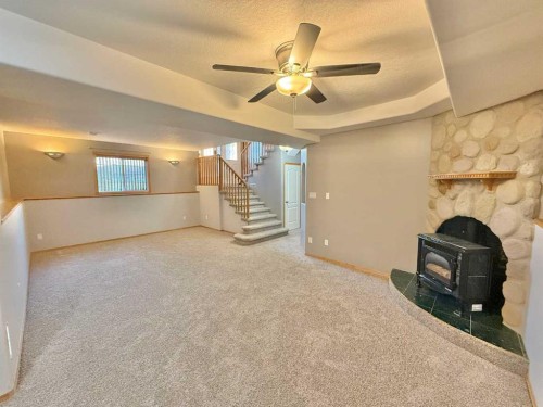 131 Tocher Avenue, Hinton, AB - Indoor Photo Showing Other Room With Fireplace