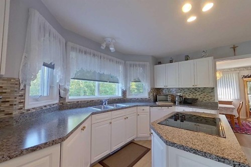 4102 Hees Drive, Athabasca, AB - Indoor Photo Showing Kitchen With Double Sink