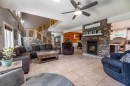 6-24426 East River Road, Hinton, AB  - Indoor Photo Showing Living Room With Fireplace 