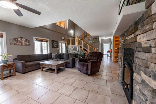 6-24426 East River Road, Hinton, AB - Indoor With Fireplace
