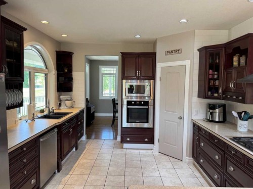 100 Aspen Drive, Athabasca, AB - Indoor Photo Showing Kitchen With Double Sink