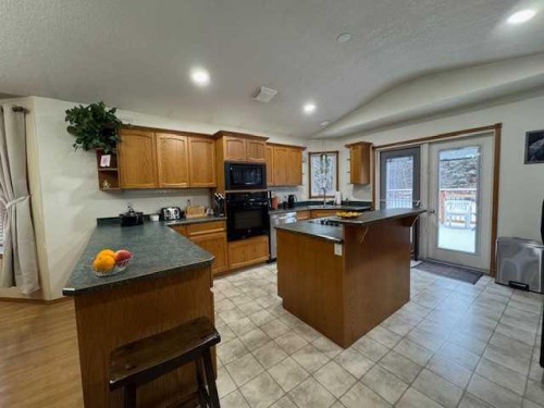 6336 15 Avenue South, Edson, AB - Indoor Photo Showing Kitchen With Double Sink