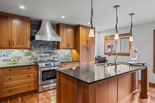 7 Creekside Mews, Canmore, AB - Indoor Photo Showing Kitchen With Double Sink With Upgraded Kitchen