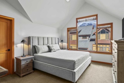 7 Creekside Mews, Canmore, AB - Indoor Photo Showing Bedroom