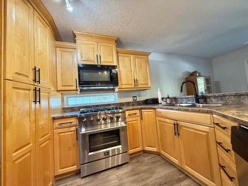 114 Poplar Drive, Whitecourt, AB - Indoor Photo Showing Kitchen With Double Sink
