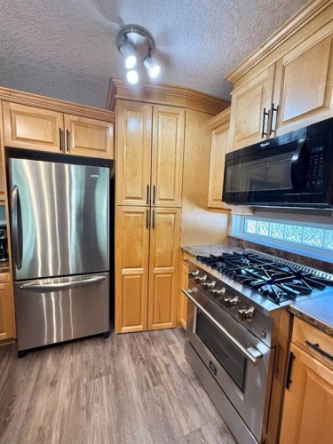 114 Poplar Drive, Whitecourt, AB - Indoor Photo Showing Kitchen With Stainless Steel Kitchen