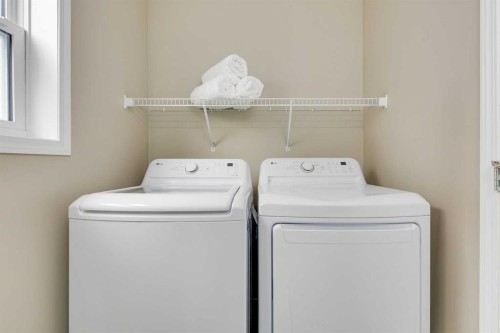 67 Saddlebrook Place Ne, Calgary, AB - Indoor Photo Showing Laundry Room