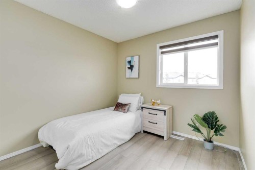 67 Saddlebrook Place Ne, Calgary, AB - Indoor Photo Showing Bedroom