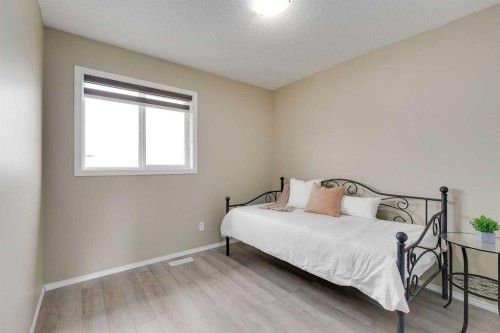 67 Saddlebrook Place Ne, Calgary, AB - Indoor Photo Showing Bedroom