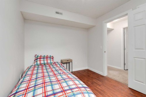 67 Saddlebrook Place Ne, Calgary, AB - Indoor Photo Showing Bedroom