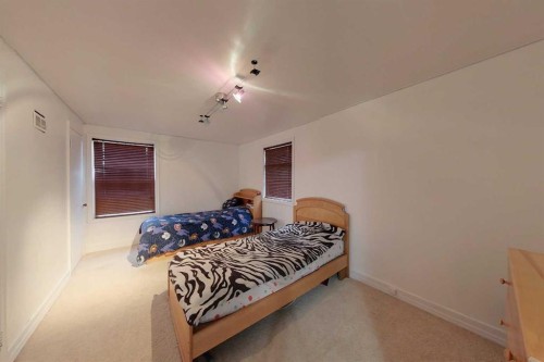 72034 Weather Station Road, Wagner, AB - Indoor Photo Showing Bedroom