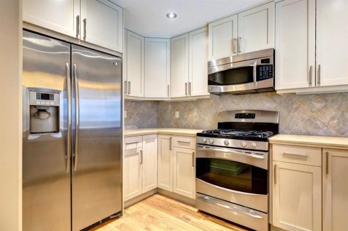 203-901 8Th Avenue, Canmore, AB - Indoor Photo Showing Kitchen With Stainless Steel Kitchen With Upgraded Kitchen