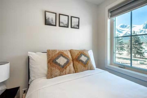 3-1717B Mountain Avenue, Canmore, AB - Indoor Photo Showing Bedroom