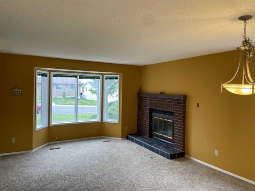 5 Hillside Crescent, Swan Hills, AB - Indoor With Fireplace