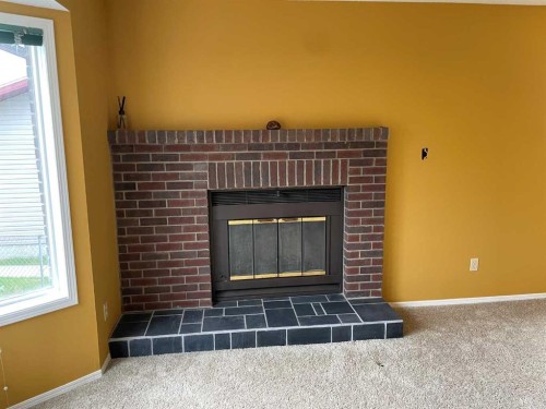 5 Hillside Crescent, Swan Hills, AB - Indoor With Fireplace