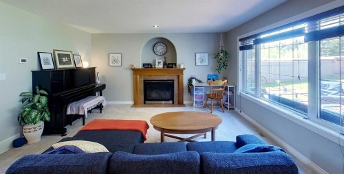 6138 11 Avenue, Edson, AB - Indoor Photo Showing Living Room With Fireplace