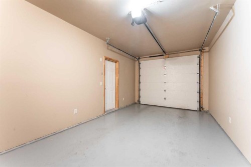 2-300 Eagle Terrace Road, Canmore, AB - Indoor Photo Showing Garage