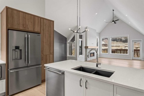 201J-209 Stewart Creek Rise, Canmore, AB - Indoor Photo Showing Kitchen With Double Sink