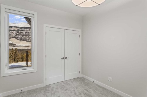 201J-209 Stewart Creek Rise, Canmore, AB - Indoor Photo Showing Other Room