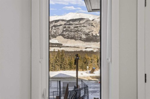 201J-209 Stewart Creek Rise, Canmore, AB - Indoor Photo Showing Other Room