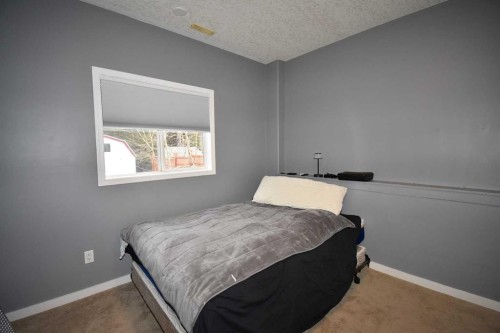309 Eaton Drive, Hinton, AB - Indoor Photo Showing Bedroom
