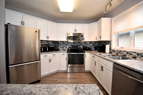 309 Eaton Drive, Hinton, AB - Indoor Photo Showing Kitchen With Double Sink