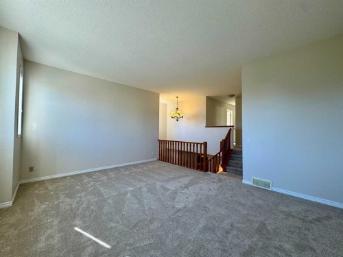 70 Glensummit Close, Cochrane, AB - Indoor Photo Showing Other Room