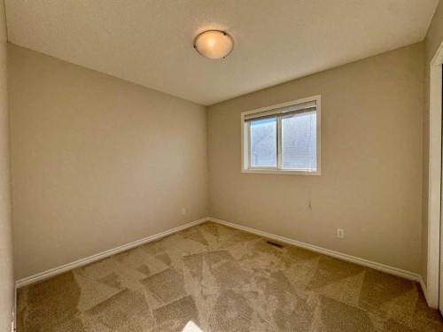 70 Glensummit Close, Cochrane, AB - Indoor Photo Showing Other Room