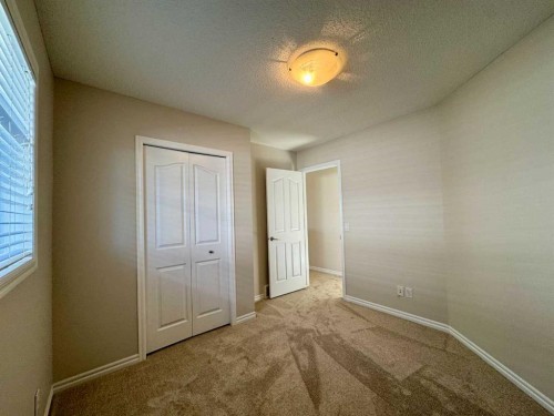 70 Glensummit Close, Cochrane, AB - Indoor Photo Showing Other Room