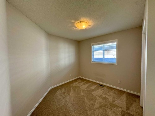 70 Glensummit Close, Cochrane, AB - Indoor Photo Showing Other Room