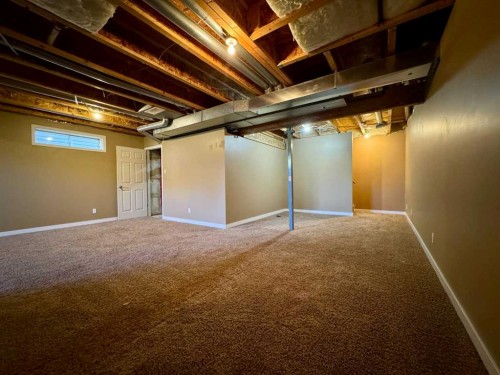70 Glensummit Close, Cochrane, AB - Indoor Photo Showing Basement