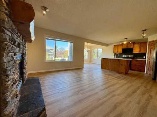 70 Glensummit Close, Cochrane, AB - Indoor With Fireplace