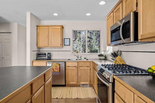 147 Benchlands Terrace South, Canmore, AB - Indoor Photo Showing Kitchen With Double Sink